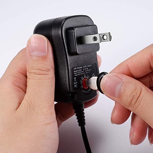 Universal 12 W Multi-Voltage AC/DC Power Adapter with 8 Interchangeable Plugs – Versatile Solution for 3 V to 12 V Electronics – Compact, Efficient, and Safe Power Supply for Home and Professional Use