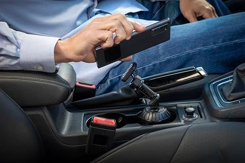Transform your driving routine with the Scosche MAGPCUP Magic Mount Power Hub, a cutting-edge magnetic car cup holder phone mount engineered for superior convenience and safety. This innovative accessory boasts a robust magnetic grip that securely holds both i Phone and Android devices, ensuring your phone stays in place for hands-free navigation. Featuring dual USB charging ports, it enables simultaneous charging of multiple devices, eliminating battery anxiety during long commutes. Designed to fit seamlessly into standard cup holders, it offers 360-degree rotation for customizable viewing angles, making it perfect for accessing GPS, music, and calls with ease. Crafted from high-quality materials, the Scosche MAGPCUP is not only durable but also stylish, enhancing your vehicle’s interior while providing unmatched functionality. Elevate your driving experience with this essential accessory that marries reliability with cutting-edge technology for the modern car enthusiast.