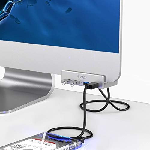 Discover the ORICO Aluminum 4-Port USB 3.0 Hub – Your Essential Desktop Connectivity Solution for Seamless Data Transfer and Enhanced Organization. Featuring a stylish clamp design, this USB splitter effortlessly attaches to your monitor or desk, optimizing your workspace without sacrificing aesthetics. With four high-speed USB 3.0 ports delivering data transfer rates up to 5 Gbps, you can connect multiple devices like external drives and keyboards with ease. The durable aluminum construction not only provides exceptional heat dissipation but also adds a touch of modern elegance to your setup. Included is a generous 4.92 FT USB data cable for increased flexibility and reach. Lightweight and compact, this hub is perfect for both home and office use, ensuring you stay connected wherever you go. Experience superior performance and reliability with the ORICO USB Hub – the perfect blend of functionality and style for tech-savvy professionals. Note: This model does not include a power adapter, making it an ultra-portable accessory for your digital life.