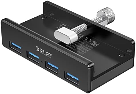 Discover the ORICO Aluminum 4-Port USB 3.0 Hub – Your Essential Desktop Connectivity Solution for Seamless Data Transfer and Enhanced Organization. Featuring a stylish clamp design, this USB splitter effortlessly attaches to your monitor or desk, optimizing your workspace without sacrificing aesthetics. With four high-speed USB 3.0 ports delivering data transfer rates up to 5 Gbps, you can connect multiple devices like external drives and keyboards with ease. The durable aluminum construction not only provides exceptional heat dissipation but also adds a touch of modern elegance to your setup. Included is a generous 4.92 FT USB data cable for increased flexibility and reach. Lightweight and compact, this hub is perfect for both home and office use, ensuring you stay connected wherever you go. Experience superior performance and reliability with the ORICO USB Hub – the perfect blend of functionality and style for tech-savvy professionals. Note: This model does not include a power adapter, making it an ultra-portable accessory for your digital life.