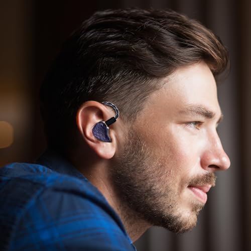 Discover the QOA Celest Wyvern Black Hi-Fi Wired In-Ear Monitors – Engineered with a Cutting-Edge Dynamic Driver for Deep Bass and Crystal Clear High Frequencies | Unique Artisan Hand-Painted Faceplate for Distinctive Personal Style | Durable Detachable 0.78 2-Pin Cable for Enhanced Longevity and Customization | Ergonomically Designed for Ultimate Comfort, Ideal for Gamers, Musicians, and Audiophiles | Versatile 3.5 mm Connector Ensures Compatibility Across All Devices. Experience Exceptional Sound Quality and Unique Aesthetic Appeal in One Premium Package.