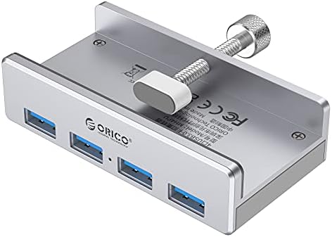 Discover the ORICO Aluminum 4-Port USB 3.0 Hub – Your Essential Desktop Connectivity Solution for Seamless Data Transfer and Enhanced Organization. Featuring a stylish clamp design, this USB splitter effortlessly attaches to your monitor or desk, optimizing your workspace without sacrificing aesthetics. With four high-speed USB 3.0 ports delivering data transfer rates up to 5 Gbps, you can connect multiple devices like external drives and keyboards with ease. The durable aluminum construction not only provides exceptional heat dissipation but also adds a touch of modern elegance to your setup. Included is a generous 4.92 FT USB data cable for increased flexibility and reach. Lightweight and compact, this hub is perfect for both home and office use, ensuring you stay connected wherever you go. Experience superior performance and reliability with the ORICO USB Hub – the perfect blend of functionality and style for tech-savvy professionals. Note: This model does not include a power adapter, making it an ultra-portable accessory for your digital life.