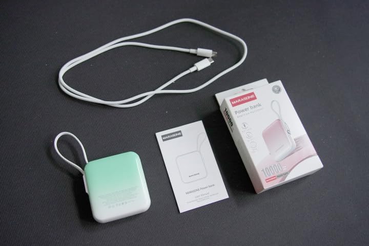 Ultra-Compact 10,000 m Ah Mini Power Bank – Fast Charging 20 W Dual Device Charger with Built-In Cables for i Phone, Samsung, Google & More – Perfect Travel Companion for On-the-Go Power Needs