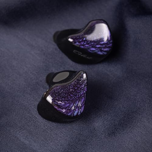 Discover the QOA Celest Wyvern Black Hi-Fi Wired In-Ear Monitors – Engineered with a Cutting-Edge Dynamic Driver for Deep Bass and Crystal Clear High Frequencies | Unique Artisan Hand-Painted Faceplate for Distinctive Personal Style | Durable Detachable 0.78 2-Pin Cable for Enhanced Longevity and Customization | Ergonomically Designed for Ultimate Comfort, Ideal for Gamers, Musicians, and Audiophiles | Versatile 3.5 mm Connector Ensures Compatibility Across All Devices. Experience Exceptional Sound Quality and Unique Aesthetic Appeal in One Premium Package.