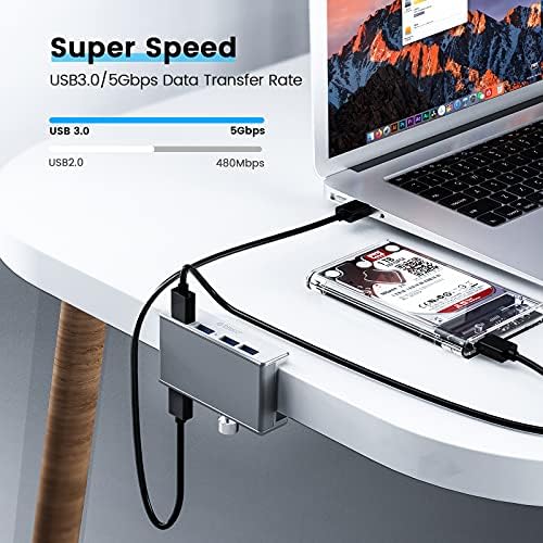 Discover the ORICO Aluminum 4-Port USB 3.0 Hub – Your Essential Desktop Connectivity Solution for Seamless Data Transfer and Enhanced Organization. Featuring a stylish clamp design, this USB splitter effortlessly attaches to your monitor or desk, optimizing your workspace without sacrificing aesthetics. With four high-speed USB 3.0 ports delivering data transfer rates up to 5 Gbps, you can connect multiple devices like external drives and keyboards with ease. The durable aluminum construction not only provides exceptional heat dissipation but also adds a touch of modern elegance to your setup. Included is a generous 4.92 FT USB data cable for increased flexibility and reach. Lightweight and compact, this hub is perfect for both home and office use, ensuring you stay connected wherever you go. Experience superior performance and reliability with the ORICO USB Hub – the perfect blend of functionality and style for tech-savvy professionals. Note: This model does not include a power adapter, making it an ultra-portable accessory for your digital life.