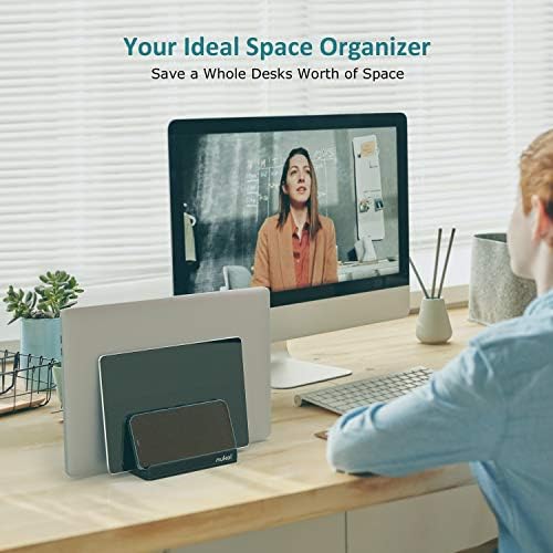 Transform Your Workspace with SPACEMax Premium Vertical Laptop Stand – Adjustable Aluminum Holder for Laptops Up to 17.3” Featuring Advanced Anti-Tip GRIPLock Technology – Versatile 4-Slot Design for Tablets and Phones – Elegant Silver Finish for a Modern Desk Aesthetic – Enhance Your Workflow Efficiency and Posture with Lightweight, Durable Construction