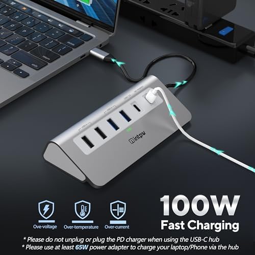 Transform Your Digital Workspace with a Multifunctional 9-in-1 USB-C Docking Station – 4 K HDMI for Crystal-Clear Displays, 100 W PD Fast Charging, and High-Speed Data Transfer (5 Gbps) – Includes 3 Type-A/C Ports, 2 Type-A 2.0 Ports, and SD/TF Card Reader – Premium Aluminum Hub Ideal for Mac Book, i Pad, and i Phone Users – Compact, Stylish, and Perfect for Travel Connectivity!
